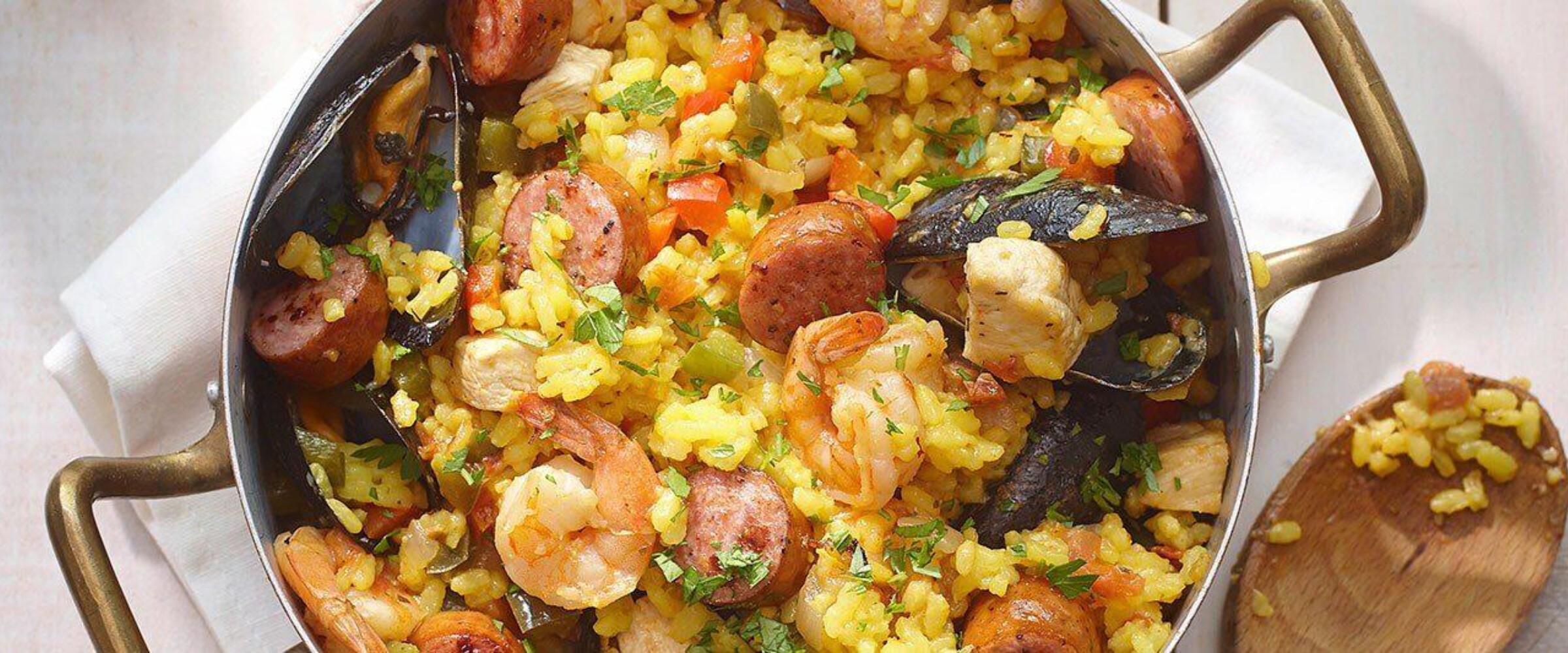 Photo of paella with chicken and sausage