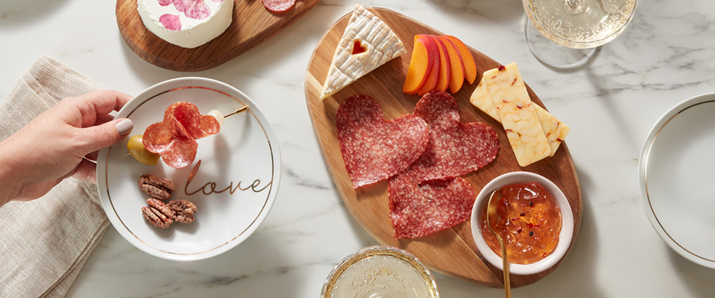 Heart and flowered shape salami on charcuterie boards