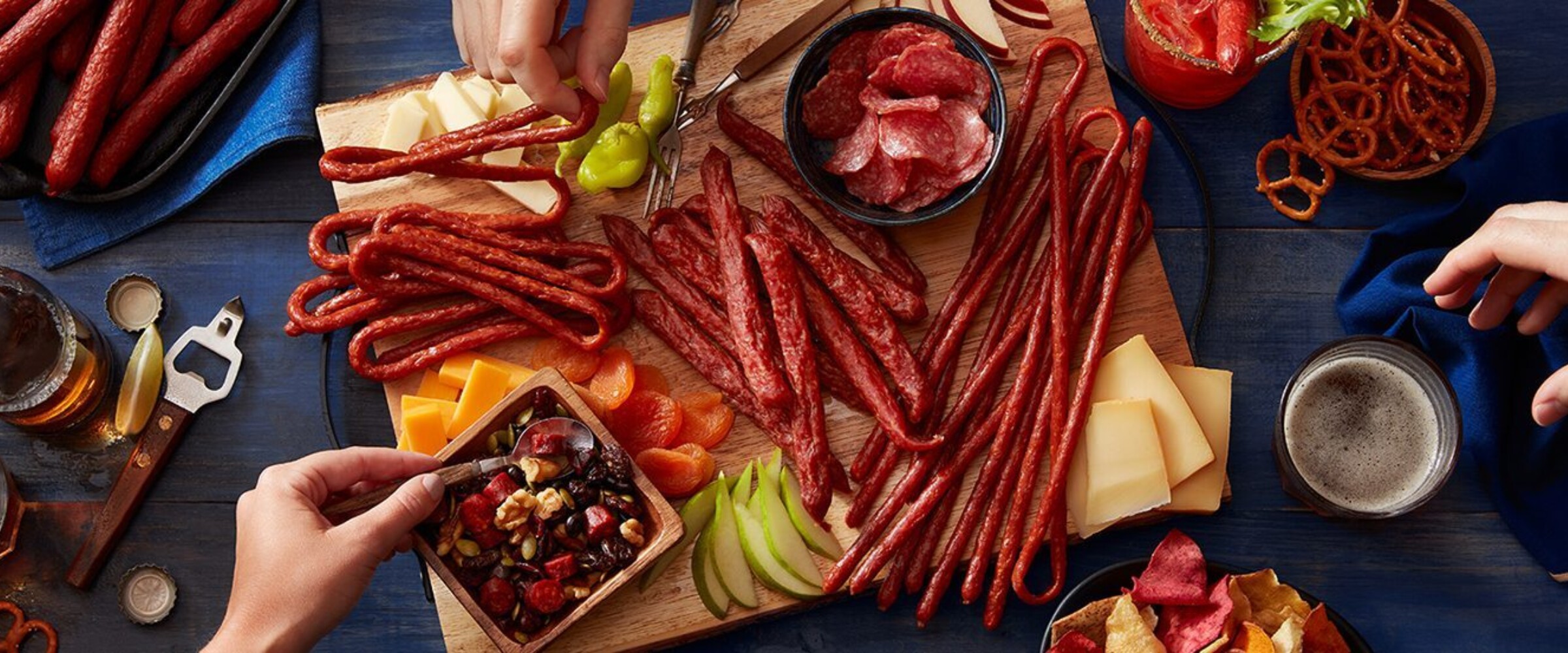 People enjoying snack board