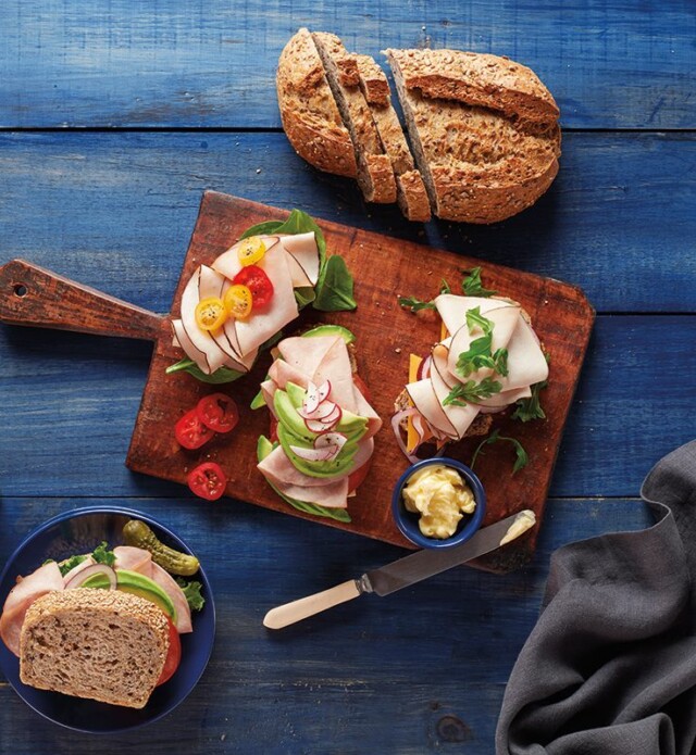 Sliced Meat with fresh ingredients on a board