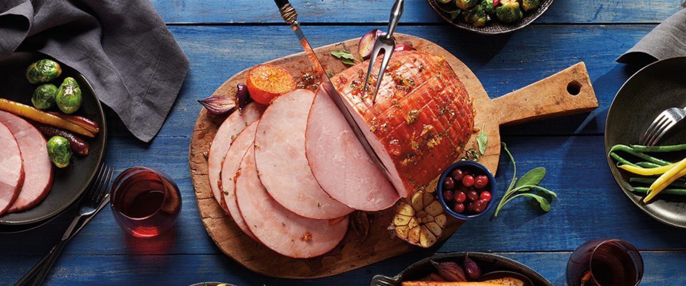 Photo of glazed ham sliced up