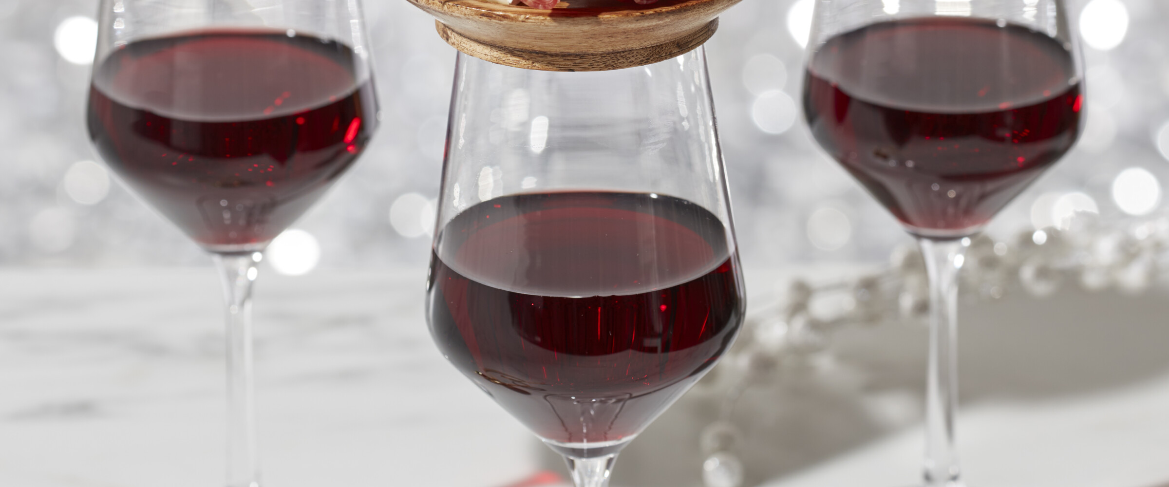 Mini Charcuterie boards on top of wine glasses