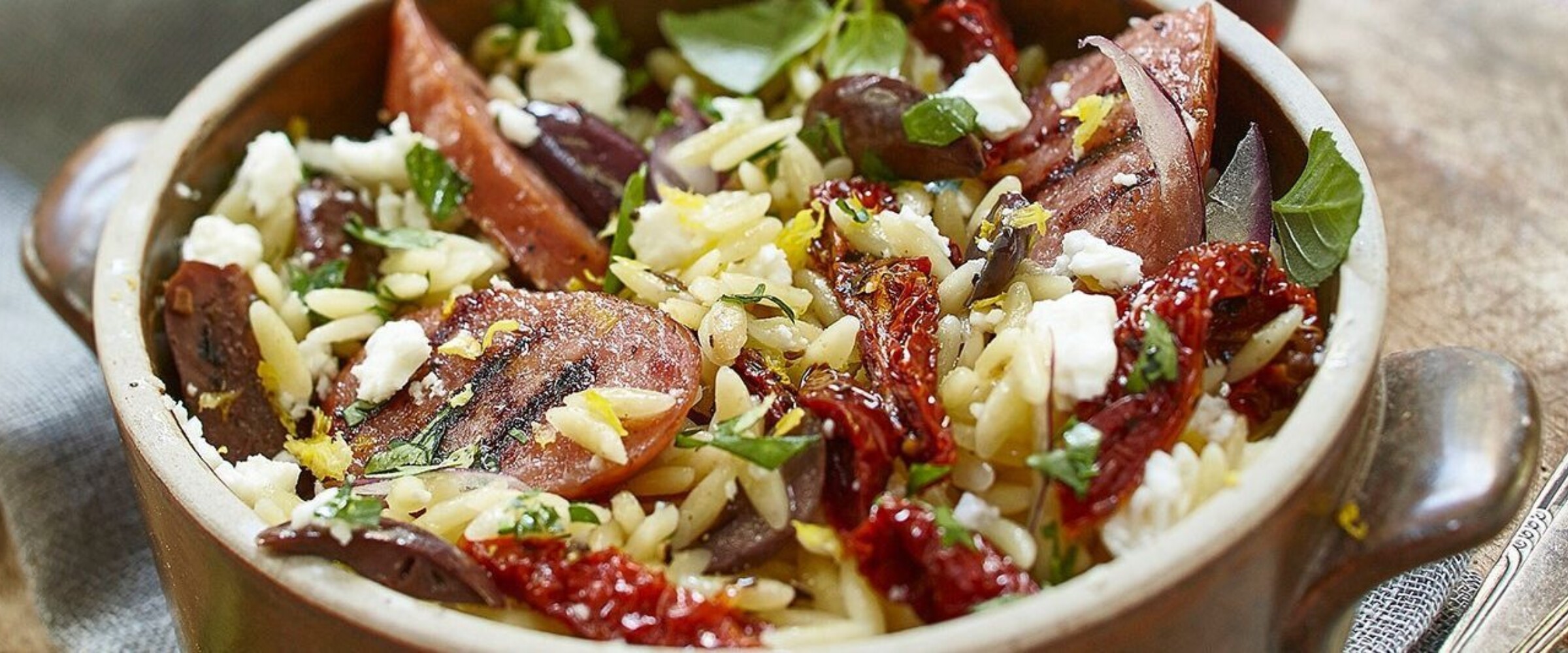 Cheddar knackwurst and orzo salad