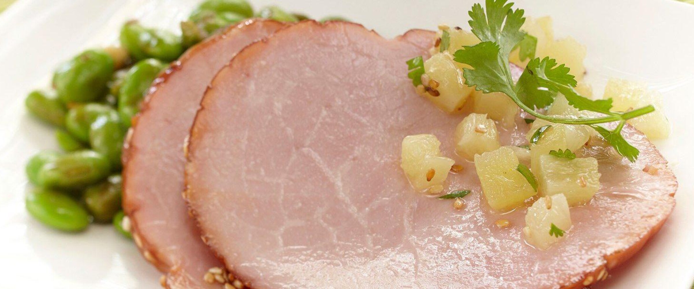 Ham with apricot maple glaze on a plate