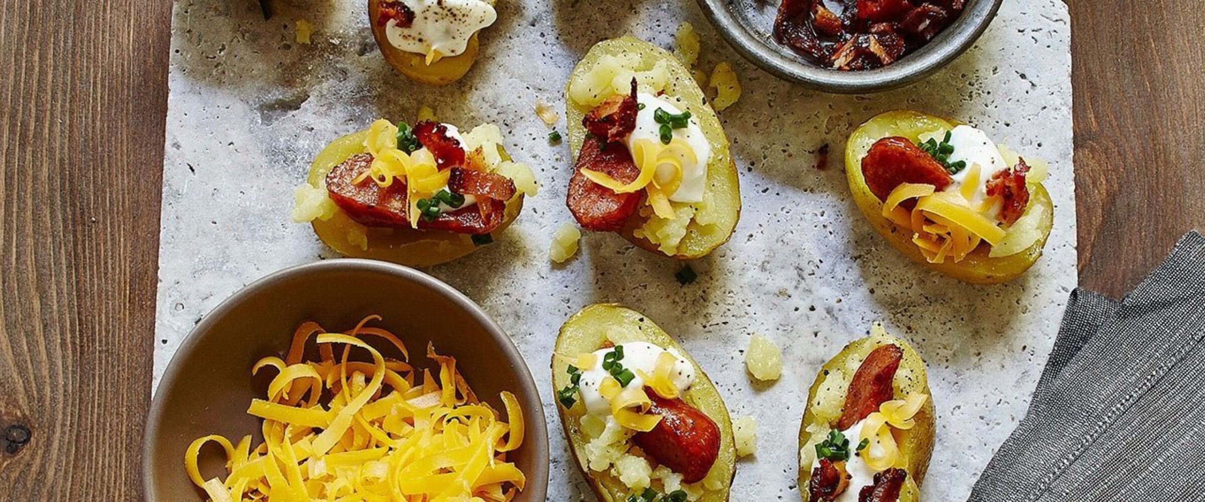 Loaded baked potatoes with pepperoni