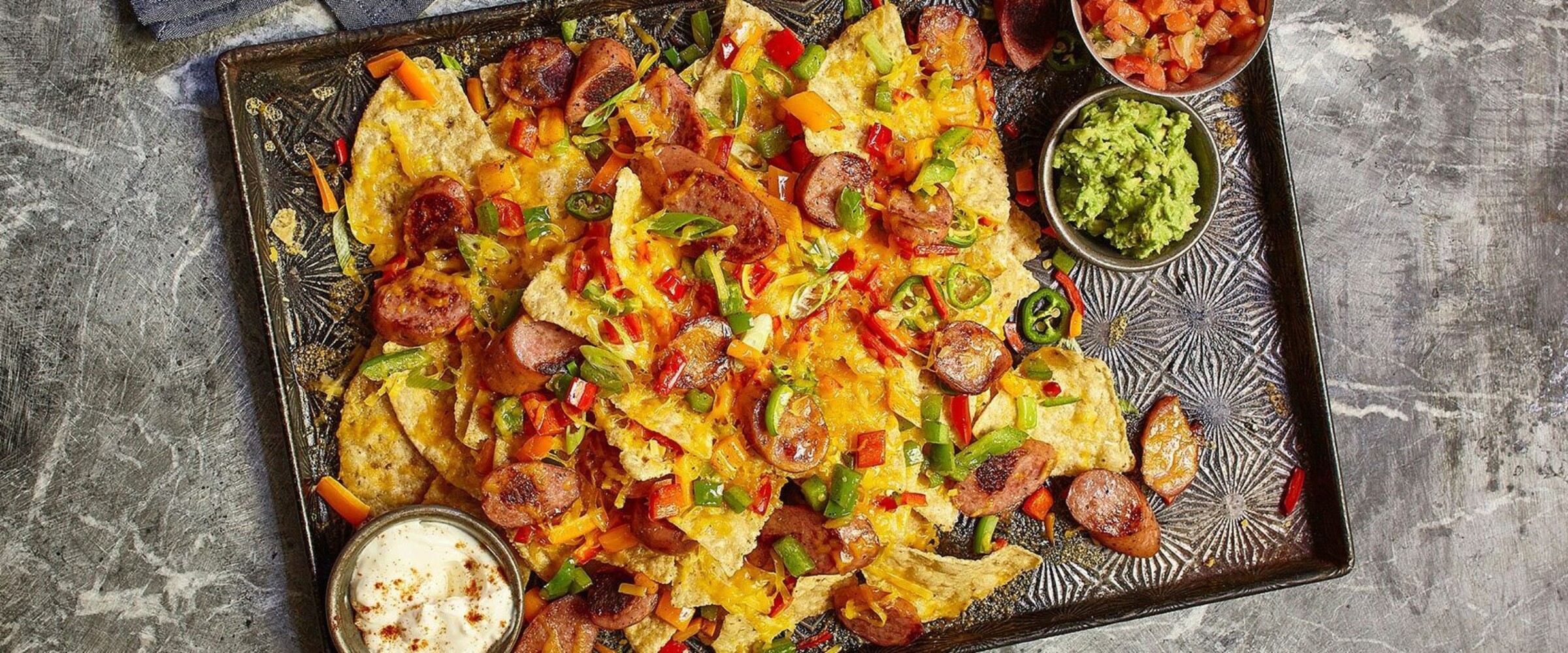 Nachos with Grillwurst sausage