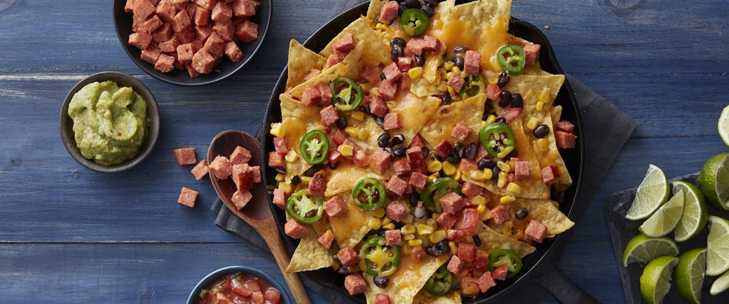 Picture of Nachos made with chorizo, jalapenos, corn and black beans