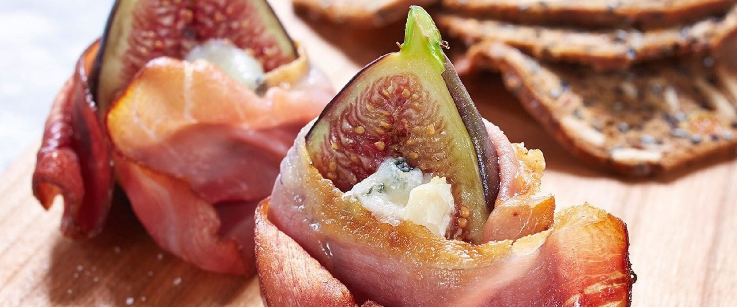 Speck prosciutto wrapped figs with cheese