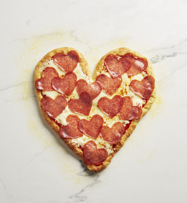 Heart shape pizza with heart salami