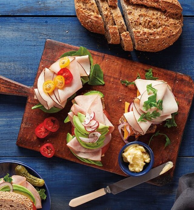 Open faced sandwich on a cutting board