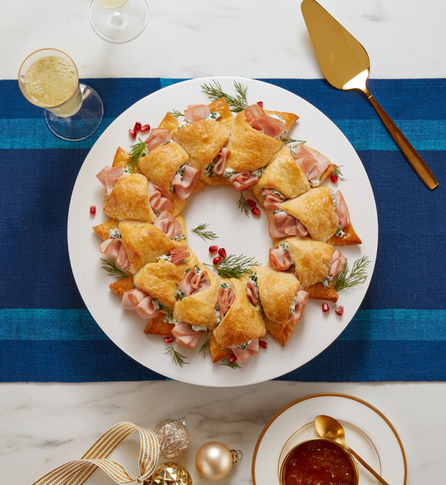 ham and cheese pastry wreath on blue runner