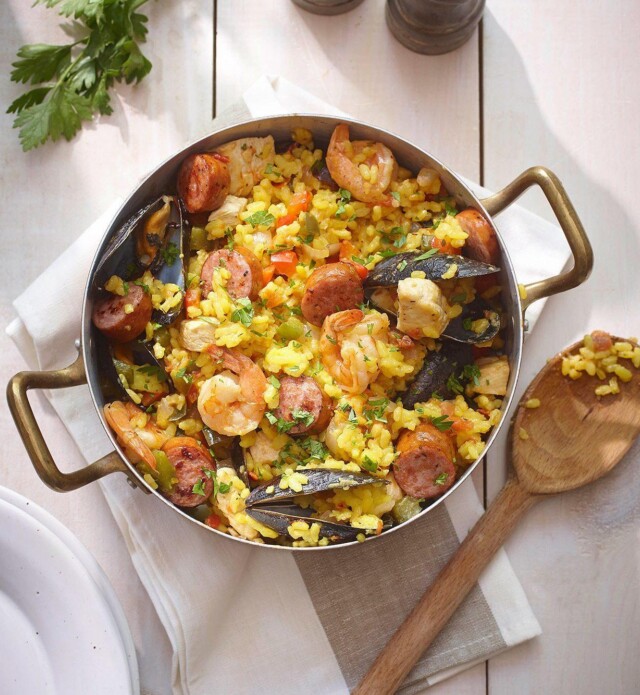 Paella with chicken and sausage in a dish