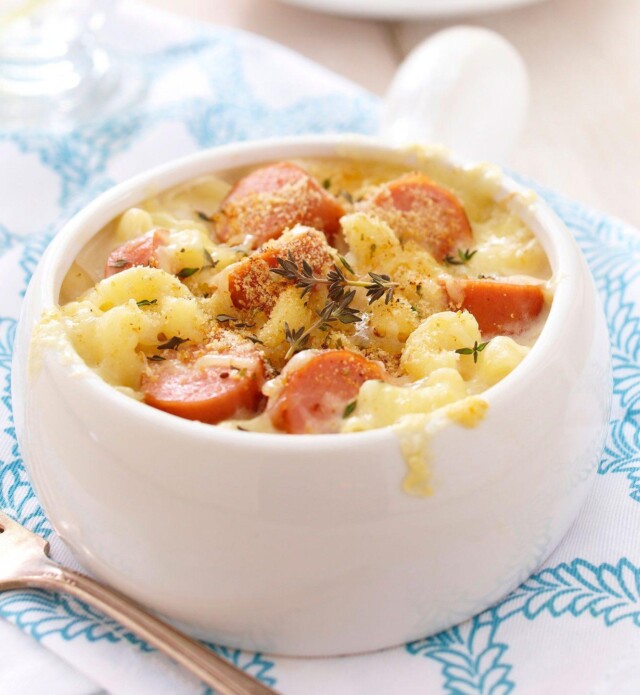 Macaroni casserole with sausage in a white bowl