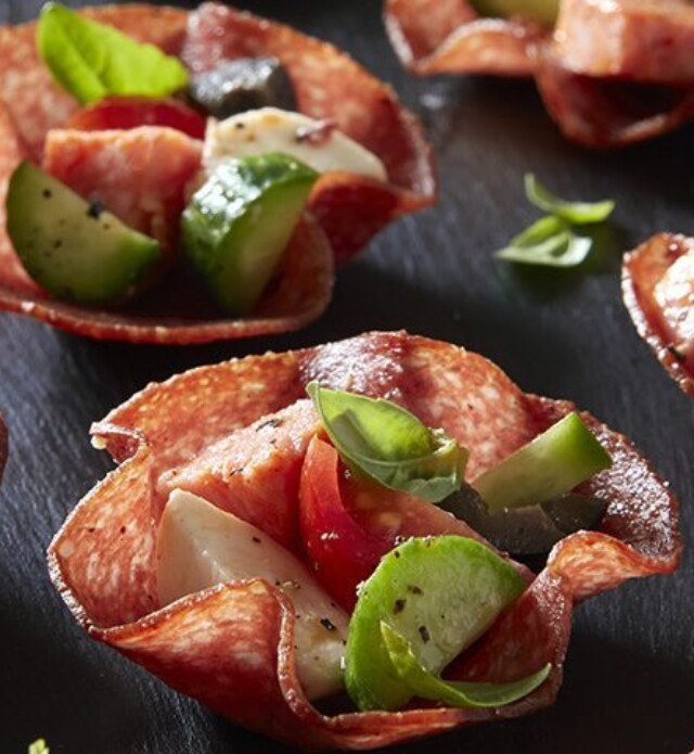 Salami cups with cheese, tomato, and cucumber