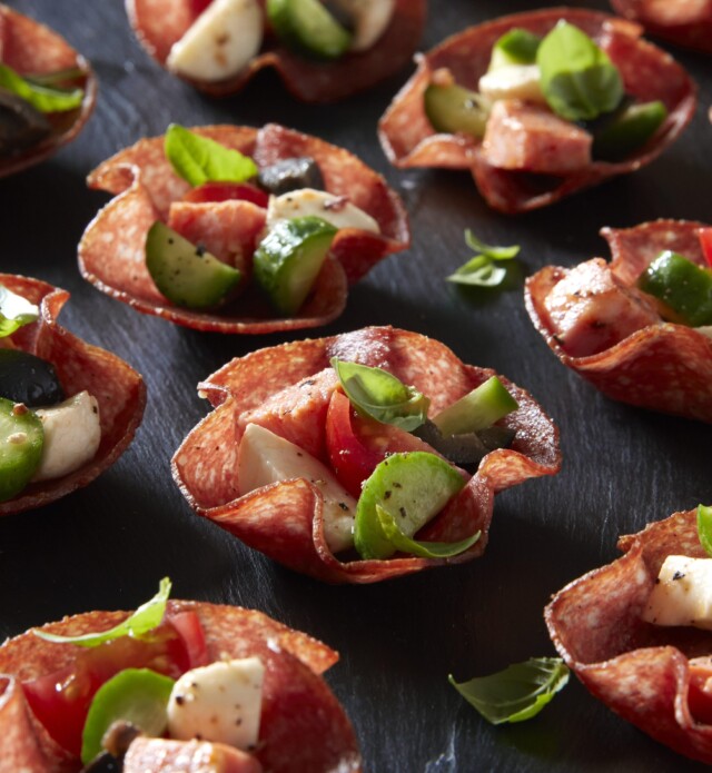 Salami cups with cheese, tomato, and cucumber
