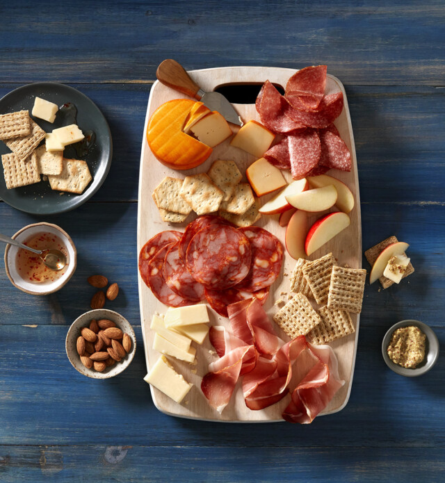 Simple charcuterie board with three meats and cheese