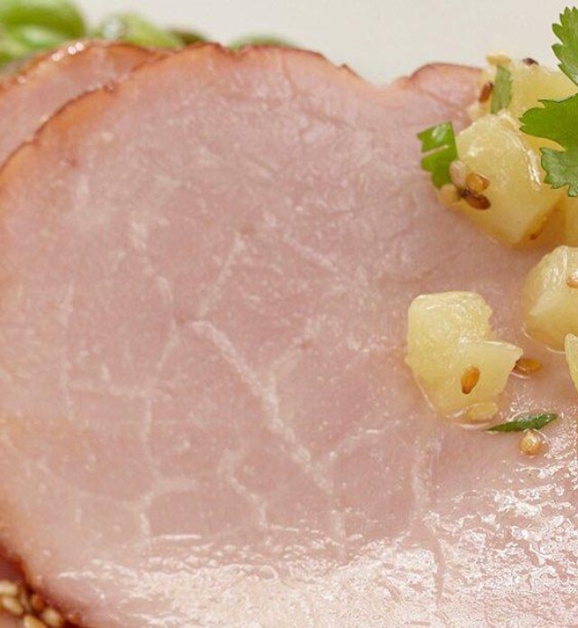 Ham with apricot maple glaze on a plate