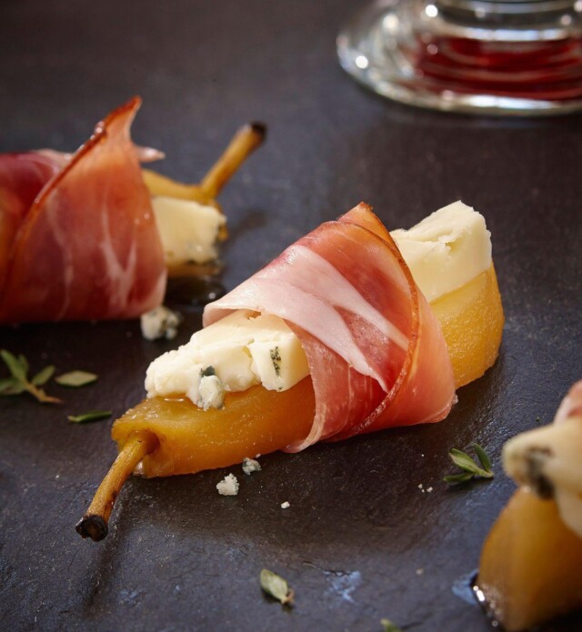 Pear wrapped with speck prosciutto and cheese